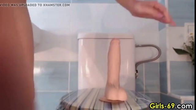 Busty Stepsister riding her dildo in the bathroom