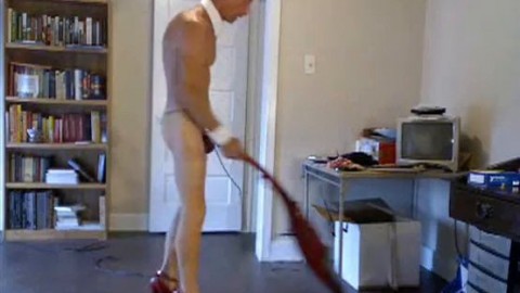 ROBERT RICHARD MILGATE CLEANING IN TAN PANTYHOSE AND HIGH HEELS