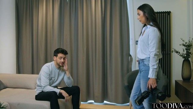 Photographer seduces sad model for a strip dance then rides his huge cock - Milan Cheek TOODIVA