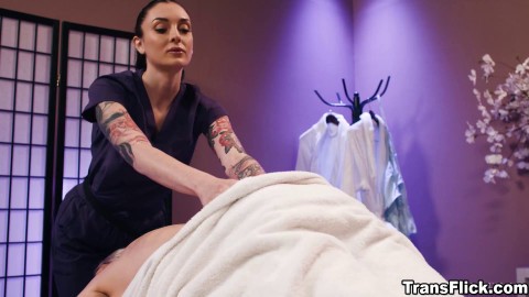 Parlor owner Charlotte Sins giving her client Aubrey Kate a massage