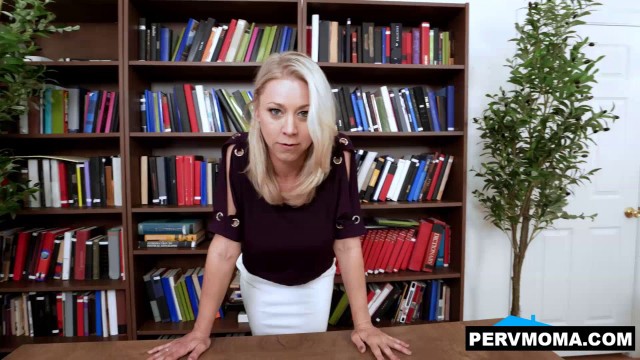Stepmom Katie Morgan cant resist sucking stepsons cock under the desk