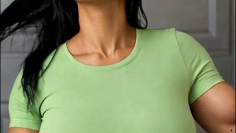 Hot Muscular Transgirl in Green Top Shows Off Her Bulge